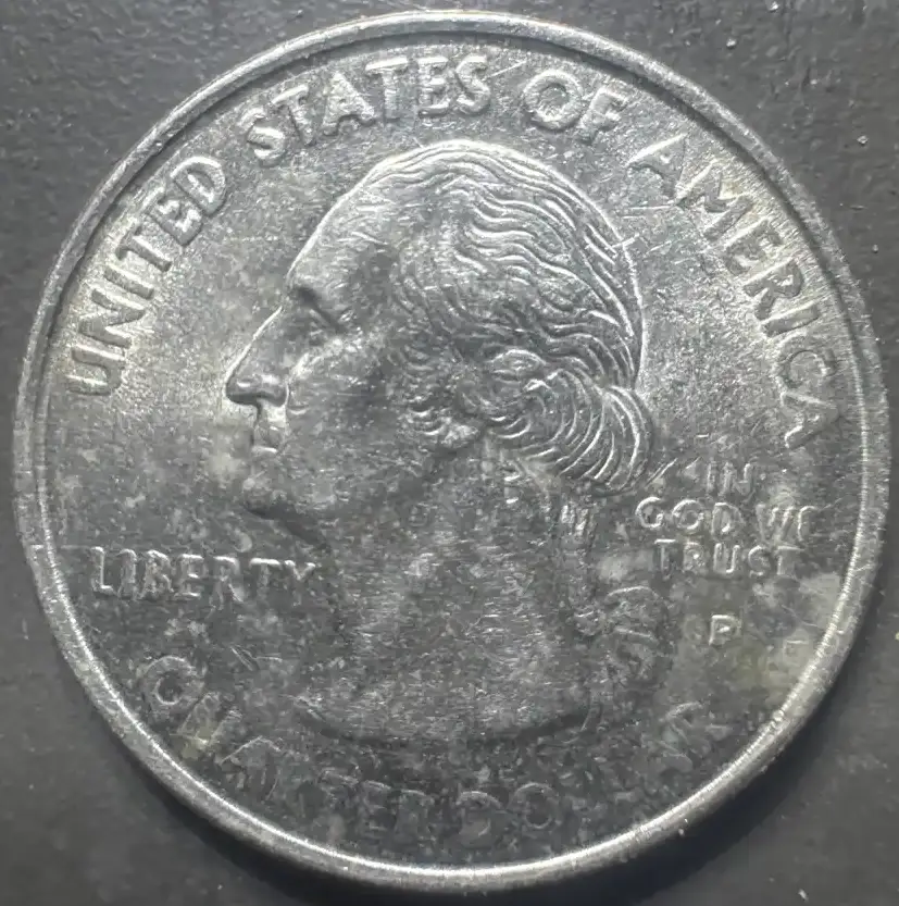 1999-P-Connecticut--Quarter---A-Mark-Going-Through-The-E-In-Connecticut