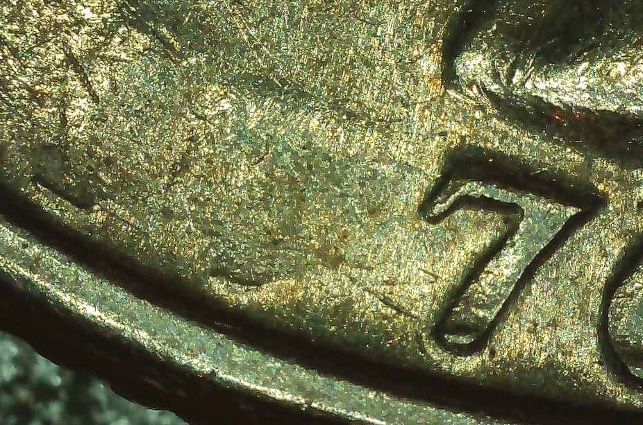 1976-D-Bicentennial-Quarter-With-Strike-Thru-Grease?