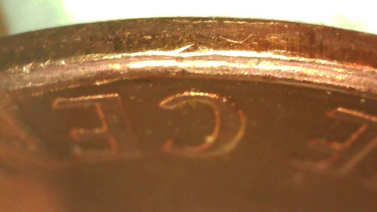 2007-Penny-With-Strange-Strike-On-Reverse-Rim