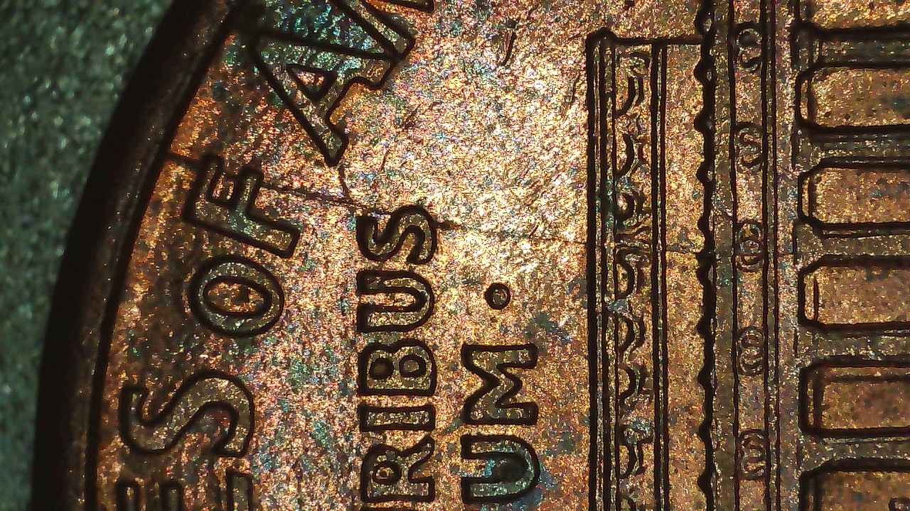 1995-Penny-With-Trifecta-Bie,-Spike-Head-&-Nice-Die-Crack