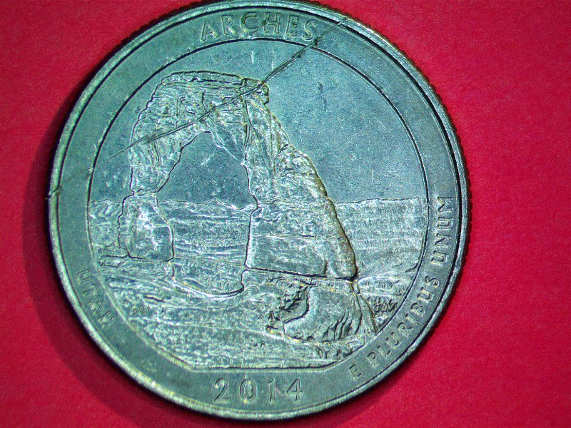 2014-D-Quarter-With--Struck-Thu-With-Wire