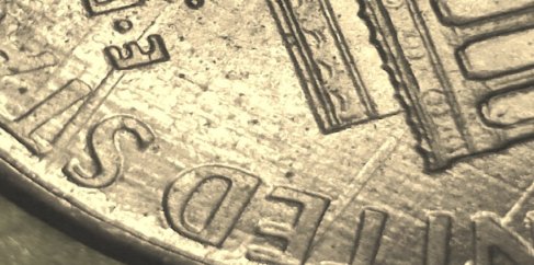 1996-Penny-With-Multiple-Cloth-Etching?