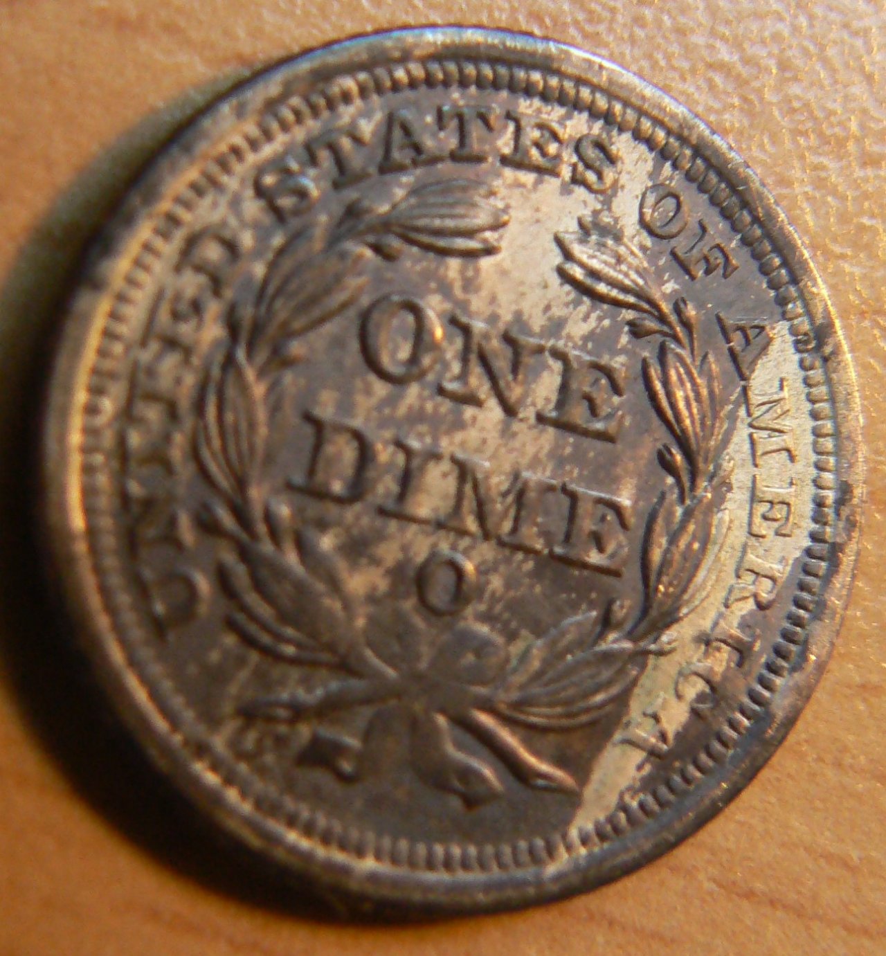 Seated-Liberty-Dime-1853-O---Severely-Discolored