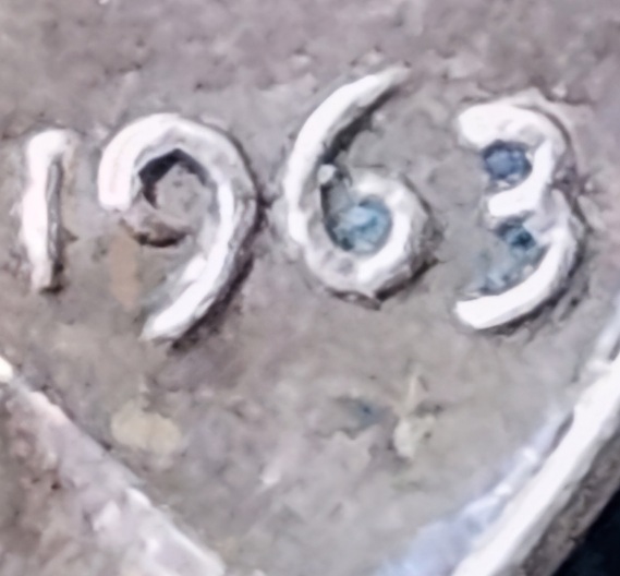 1963-Penny-Mystery-Face-Under-The-Date-On-The-Obverse-Side
