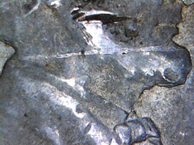 1943-Steel-Penny-With-A-White-Line-Bisecting-Coin.