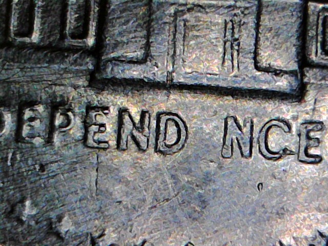 1976-Kennedy-Half-Dollar-Struck-Through-Grease?