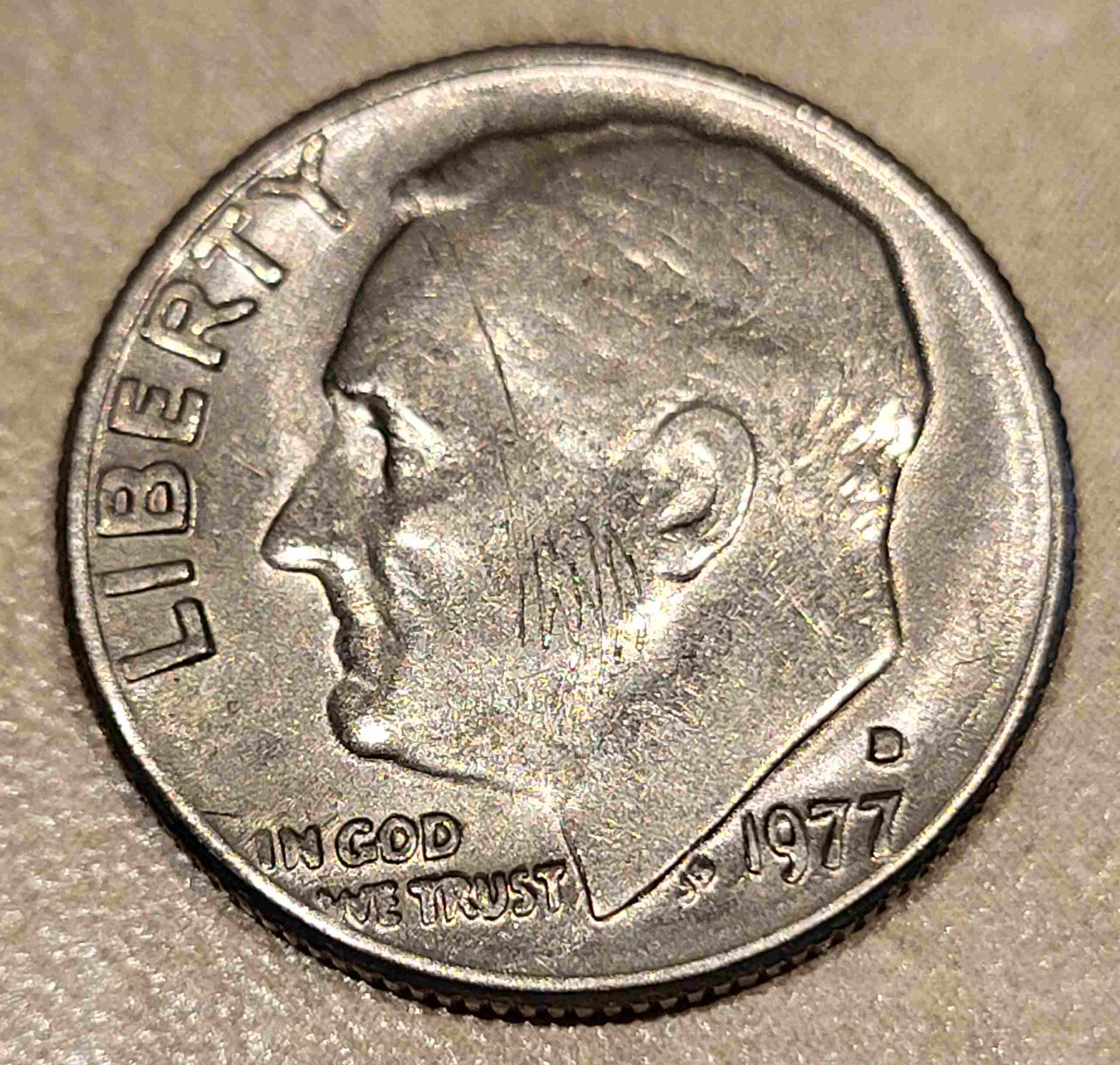 1977-D-Roosevelt-Dime-With-Copper-Stripe-On-Back