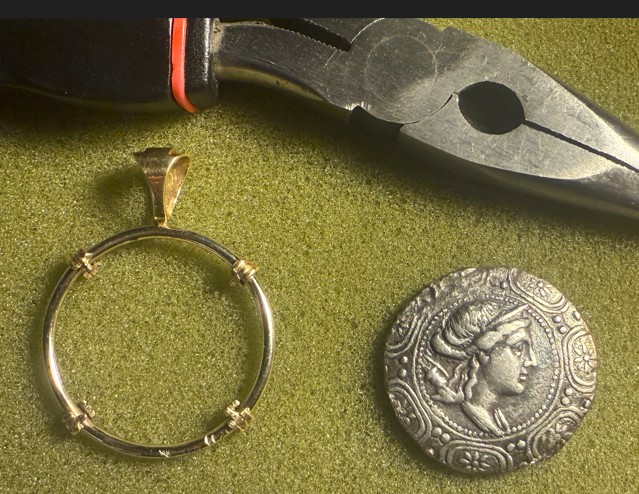 Removing-Coin-From-Bezel