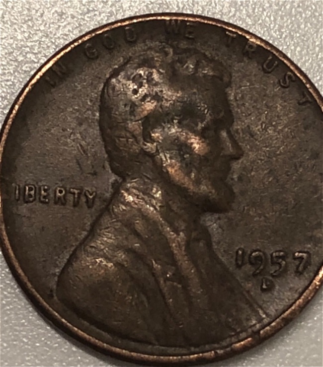 1957-D-And-1965-Black-Penny-.-Any-Value-For-This-Coins?