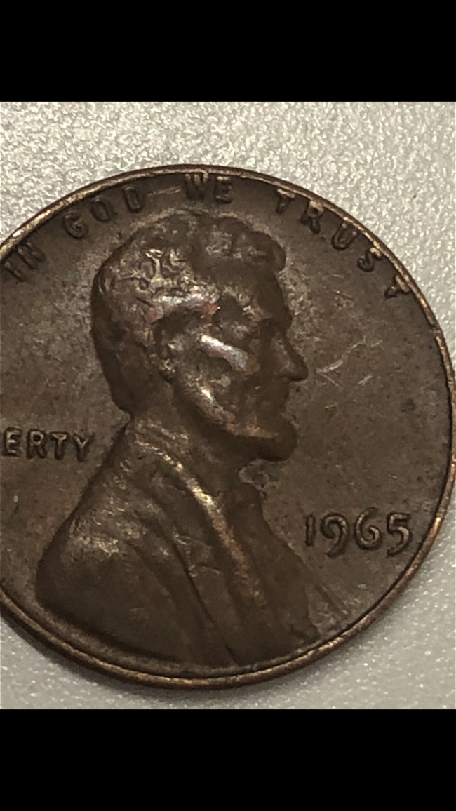 1957-D-And-1965-Black-Penny-.-Any-Value-For-This-Coins?