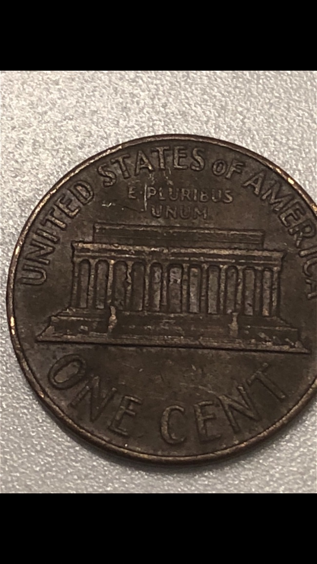 1957-D-And-1965-Black-Penny-.-Any-Value-For-This-Coins?