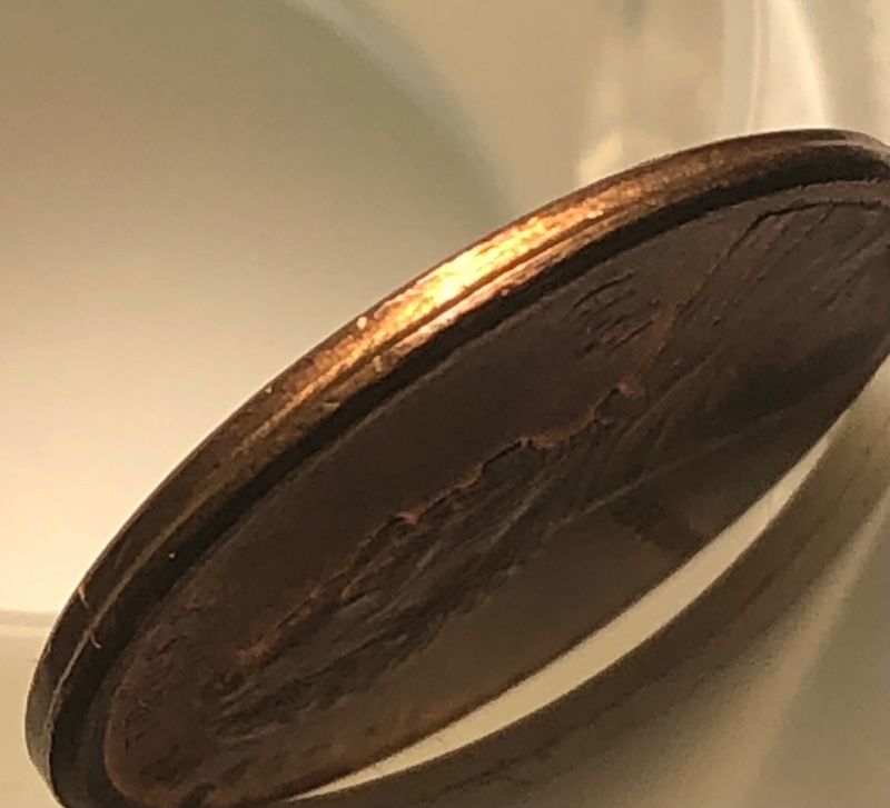 1999-Penny-Offcenter-And--Clamshell-And-Name-Above-We?