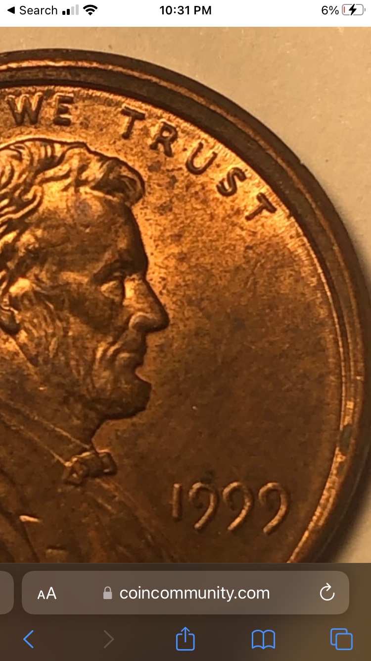 1999-Penny-Offcenter-And--Clamshell-And-Name-Above-We?