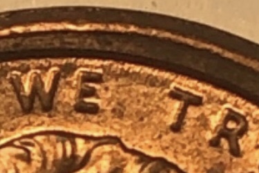 1999-Penny-Offcenter-And--Clamshell-And-Name-Above-We?