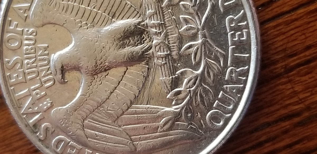 1998-P-Quarter-Reverse-Looks-To-Have-A-Something-Under-The-Eagle