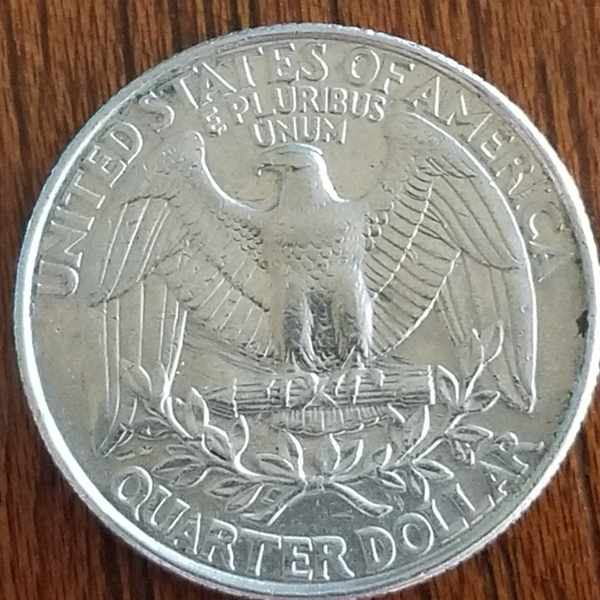 1998-P-Quarter-Reverse-Looks-To-Have-A-Something-Under-The-Eagle