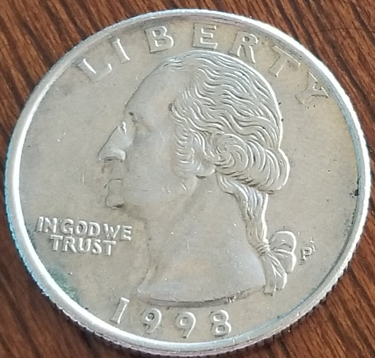 1998-P-Quarter-Reverse-Looks-To-Have-A-Something-Under-The-Eagle