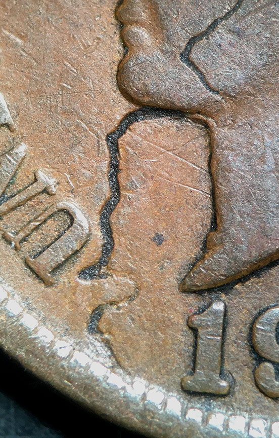 1901-Indian-Head-Cent---Cool-Struck-Through-Or-Damage
