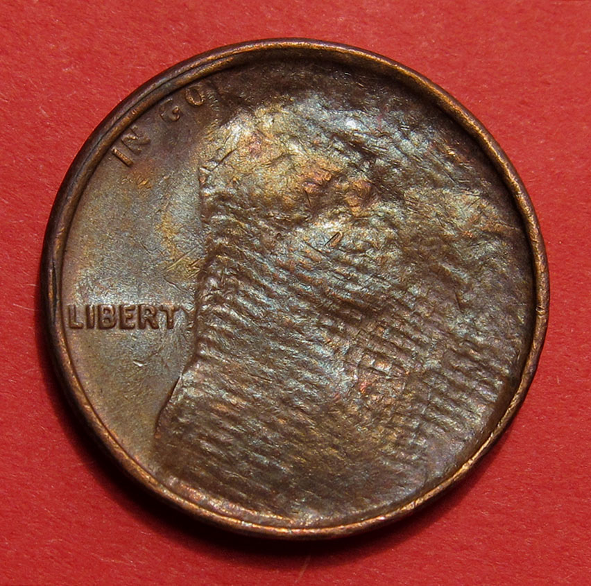 No-Date-Lincoln-Memorial-Cent-Mint-Error---Struck-Through-Cloth