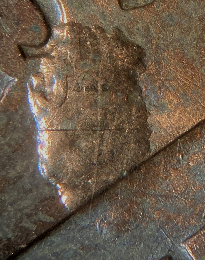 1971-D-Lincoln-Memorial-Cent-Mint-Error---Struck-Through-Lamination-Flake