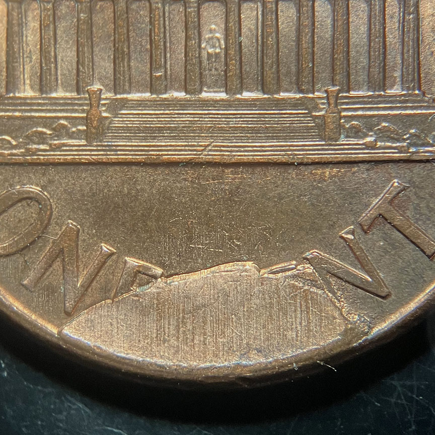 1990-Lincoln-Memorial-Cent-Mint-Error---Reverse-Cud