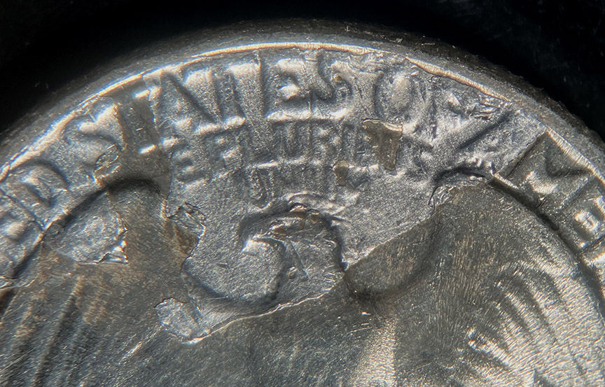 1948-Washington-Quarter-Mint-Error---Struck-Through-Retained-Metal
