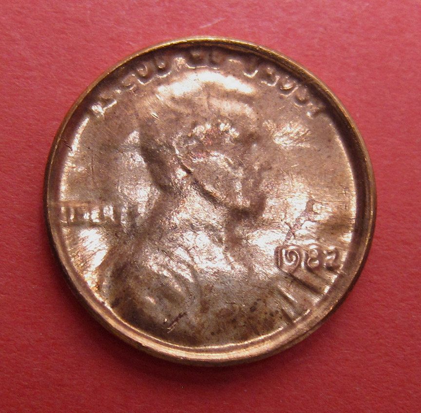 1982-Lincoln-Memorial-Cent-Large-Date-Copper-Mint-Error---Struck-Through-Die-Cap
