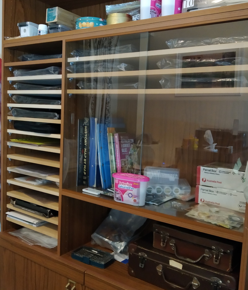 Rehousing-An-Australian-Collection-Into-2x2's