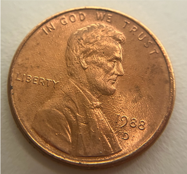 1988-D-Lincoln-Cent-Strikethrough-Error---Cloth?