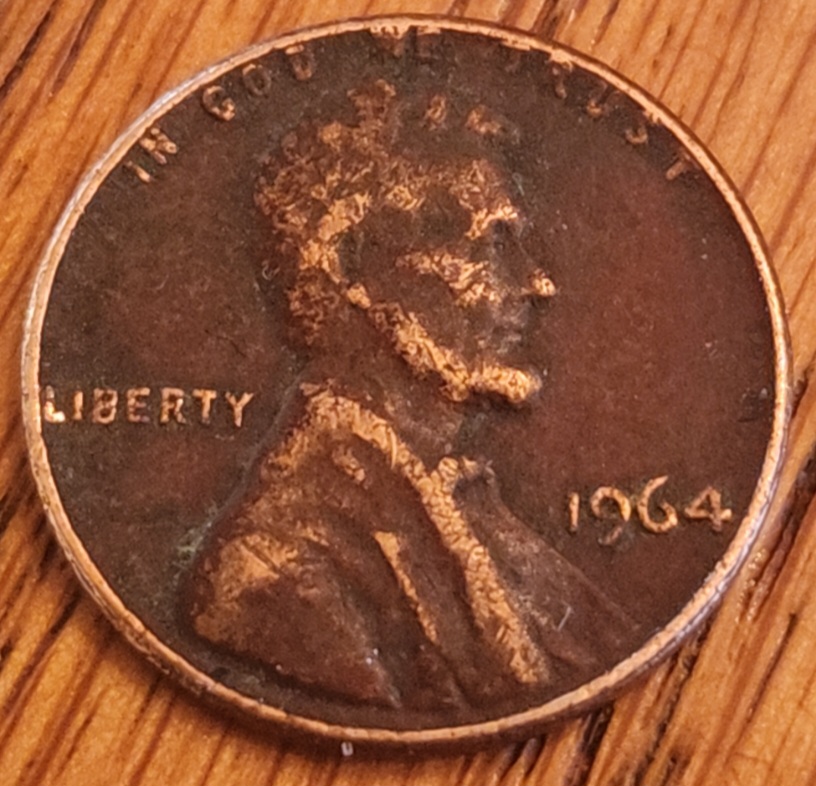 1964-Lincoln-Penny-Red-With-Letters-On-Rim.-Is-This-An-Error?