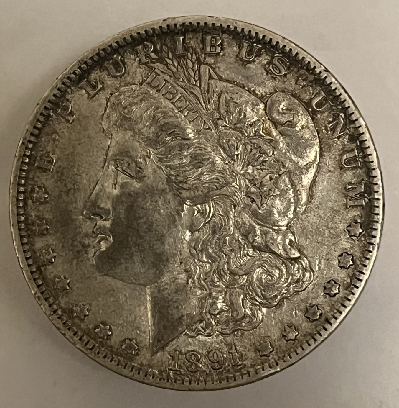1891-O-Morgan,-Grade?-Cleaned?
