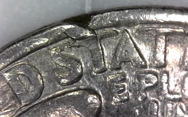 Odd-Break-In-Rim-Of-1984-P-Quarter