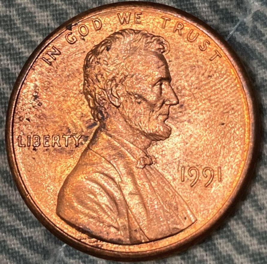 Finger-Prints-On-Lincoln-Pennies