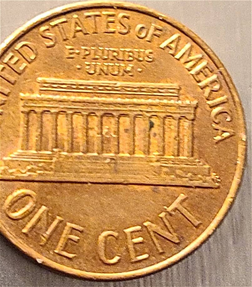 1965-Penny-Strange-Doubling-On-Obverse?