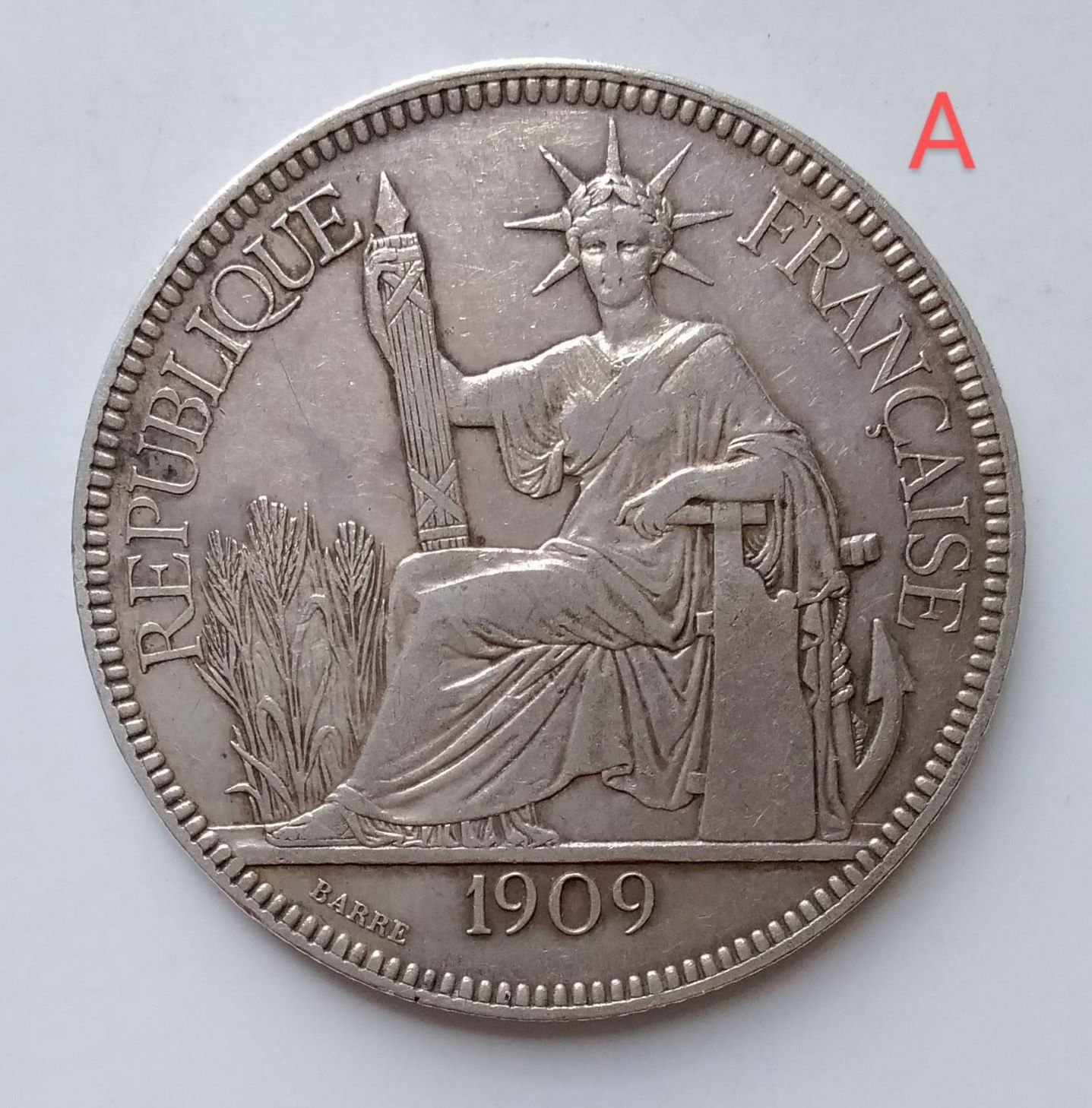 1909-French-Indo-China-Piastre.-Probably-A-Contemporary-Fake-Or-Was-It-A-Fraud-From-The-Mint?