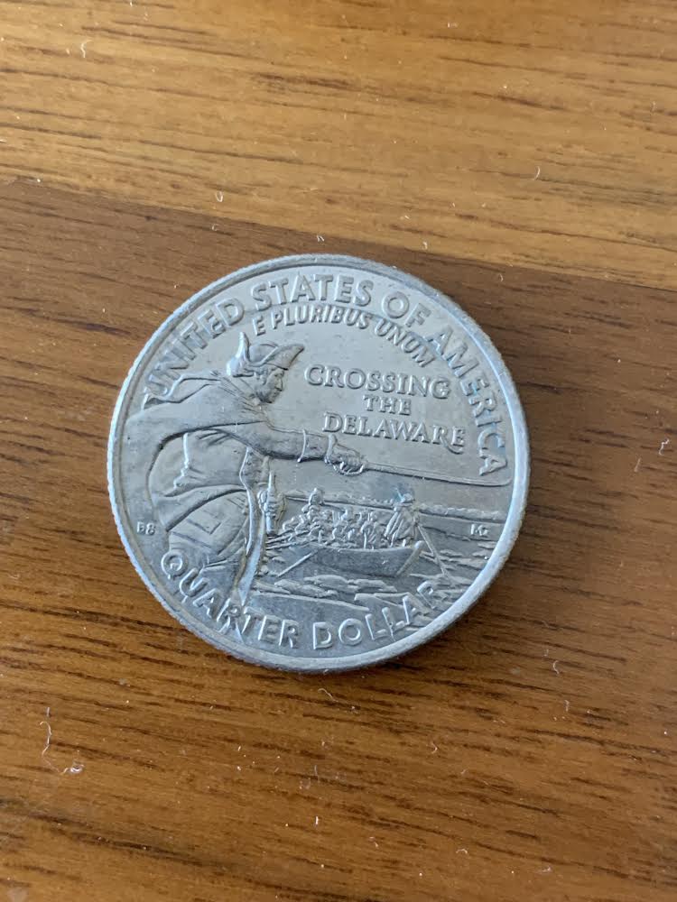 Potential-Mint-Error-Lamination-Or-Punching-On-2021-D-Crossing-The-Delaware-Quarter