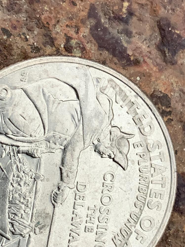 Potential-Mint-Error-Lamination-Or-Punching-On-2021-D-Crossing-The-Delaware-Quarter