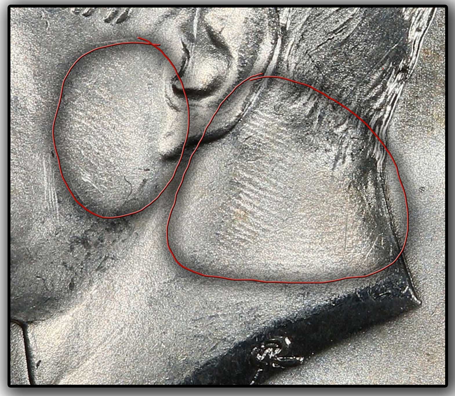 What's-The-Mark-On-Kennedy's-Neck-On-The-Half-Dollar?