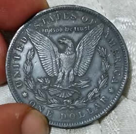 Auction-Site-Claims-This-1885-O-Morgan-Dollar-Is-BU