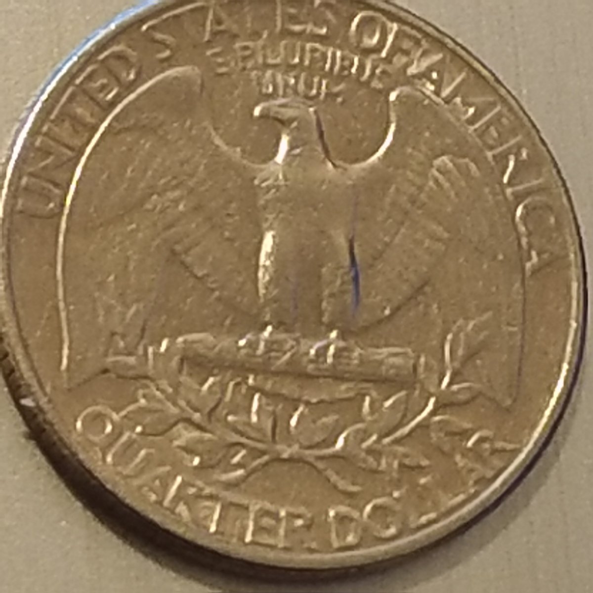 1984-Quarter-With-3-Circles-On-The-Face.-Strange?