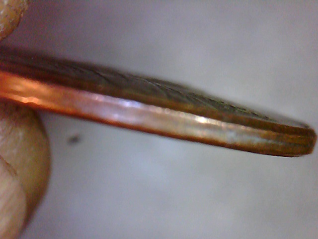 2000-D--Obverse-Is-Convex-Reverse-Is-Concave