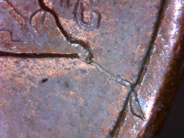 1988--LC--Good-Example-Of-Crack-Continuing-Through-Rim.