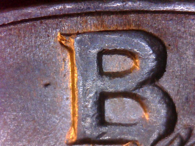 1964-D-Kennedy-Half-With-Some-Notching....common?
