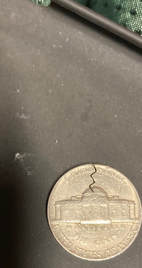 1991-Jefferson-Nickel?-I've-Read-That-The-Slit-May-Be-From-A-Staple?