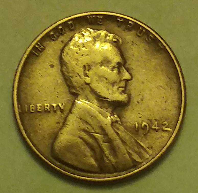 Help-Identifying-This-1942-LWC-With-An-Elongated-Tail-On-The-Two.
