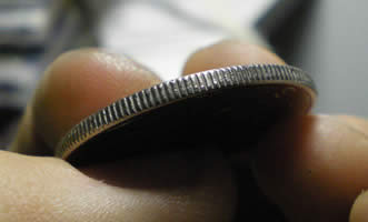 1973-Kennedy-Half-Dollar-Minted-On-An-All-Nickel-Planchet?