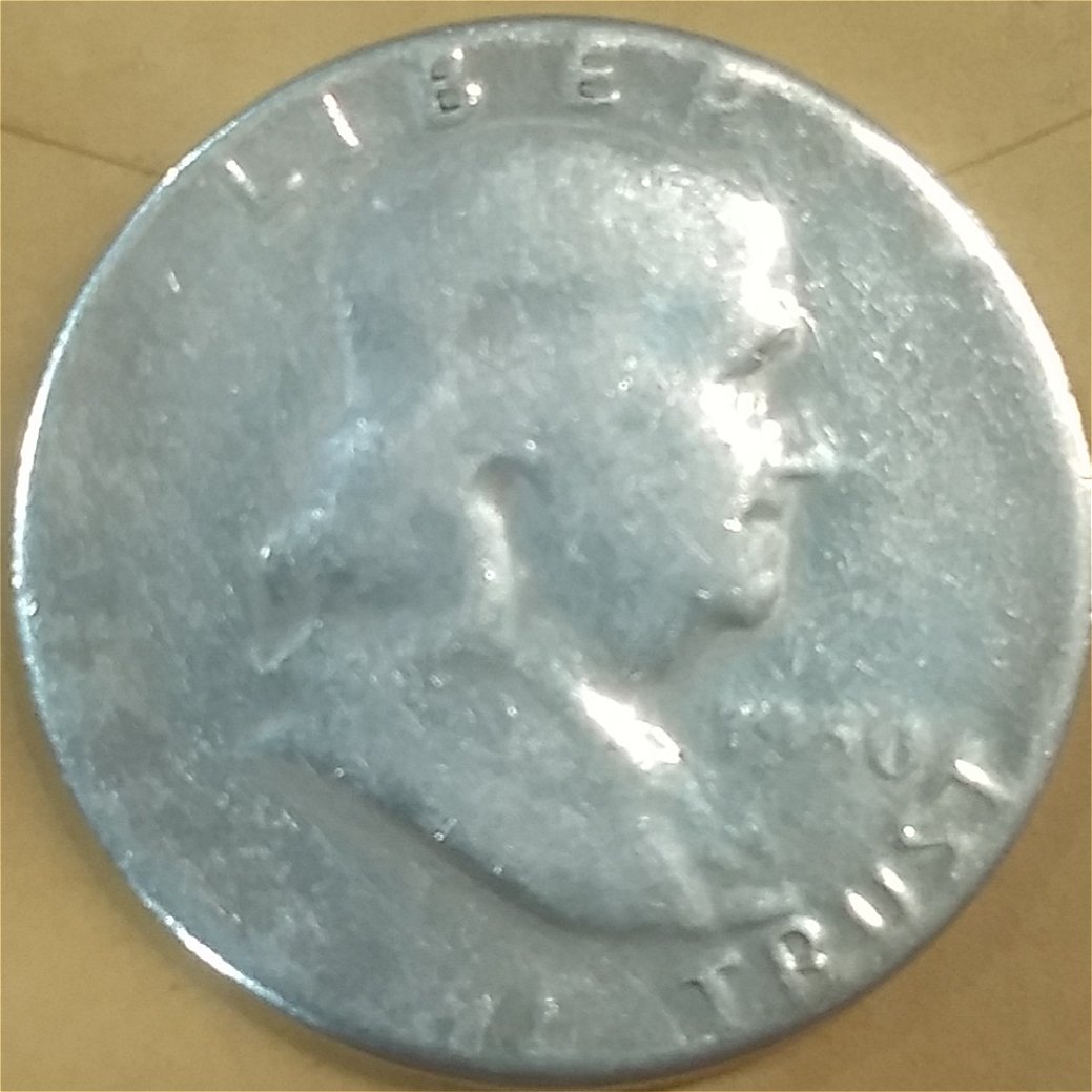 1950-Franklin-Half-Dollar-Grease-Filled-Or-Capped-Die?