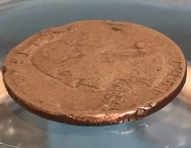 Would-You-Say-My-1967-Washington-Quarter-Dollar-Has-A-Rim-Or-Planchet-Error-Or-Is-This-PMD?