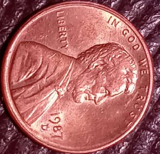 1987-D-Lincoln-Cent.-Is-It-A-Plating-Blister?-Caused-By-Heat-And-Air?