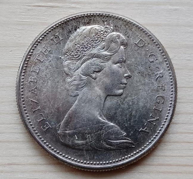 1867---1967-Canadian-Dollar-Grade?